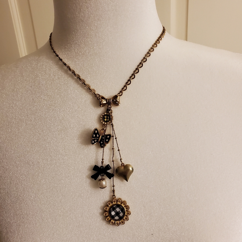Betsey Johnson Gold and Black Charm Necklace